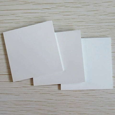 Boron Nitride Ceramic Square Sheet High Purity 99 Percent For Heat Sink Gasket And Lab Insulation Top Tier For Scientific Research 1mm By 100mm By 100mm With Excellent Thermal Conductivity And Electrical Insulation, showing front view of three sheets.
