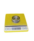 Pro Grade Genuine Premium Double Seal 6905Rs Hybrid Ceramic Bearing 25X42X9mm on a digital scale displaying 37.98g.