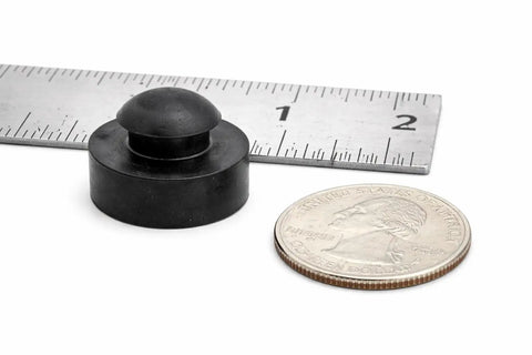 Heavy Duty Rubber Vibration Knockout Feet For Rattling Commercial Vacuum Pumps With Tight Squeeze Push Fit Half Inch Stem and Silent Running Performance Solid 12 Piece Replacement Set next to a quarter and ruler.