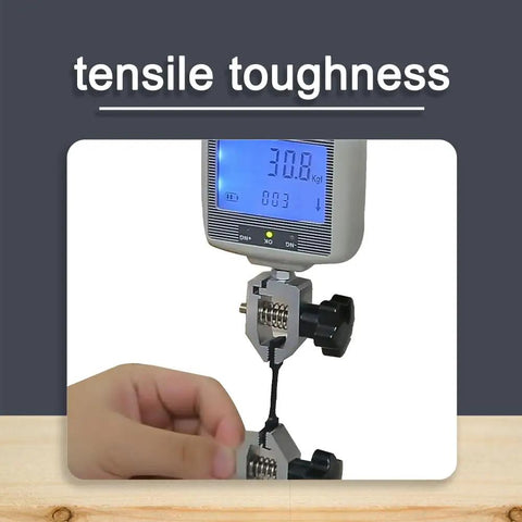 Heavy Duty 405Nm UV Curing Resin Engineered For Real World Stress Rocks Solid Toughness With Crisp Texturing And Weather Resistant Finish Built To Take A Beating On Functional Parts One Kg Jug measuring tensile toughness with a digital gauge.