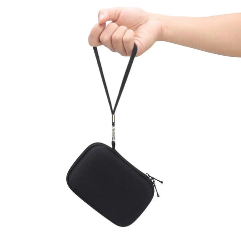 Person holding black Hard EVA Carrying Case For Samsung T7 Shield T7 And T7 Touch Portable SSDs, Shockproof, Water Resistant