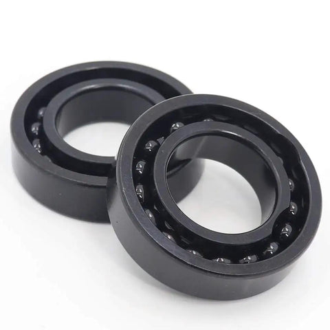 TB6014 High Temperature Bearing 70X110X20MM Full Ball Power Transmission Assembly, two black steel ball bearings.