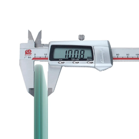 Digital caliper measuring a glass edge at 10.08 mm, showcasing precision for 32 Inch Round Tempered Glass Lazy Susan Turntable.