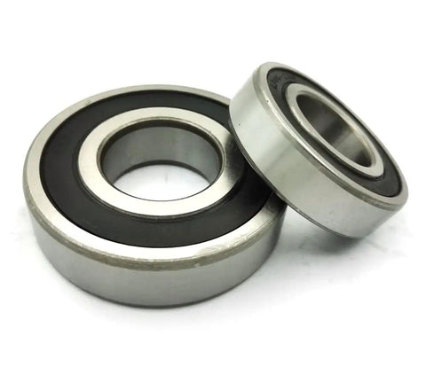 Washer Tub Bearing And Seal Kit Replacement For Whirlpool Kenmore Maytag Top Loads showing two metal bearings with black seals.