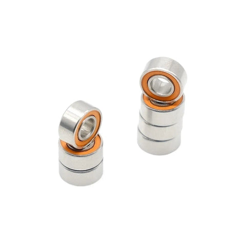 Heavy Duty Tough As Nails Ten Pack Hybrid Ceramic Stainless Steel 686RS ABEC 7 Ball Bearings 6X13X5MM stacked in pairs.
