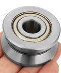 Top Shelf Heavy Duty V Groove Track Roller Sealed Ball Bearing Lv201zz showing precision ground steel design in hand