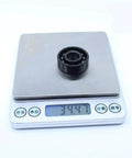 Heavy Duty TB6201 High Temp Full Ball Bearing 12X32X10Mm rated to 500C on a scale, weighs 34.47 grams, showcasing precision engineering.