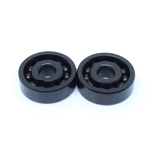 TB16005 Pro Grade High Temp Full Ball Thin Section Bearing 25X47X8MM Heat Resistant Power Transmission Component Rated To 500C, black bearings side view.
