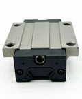 Badass Rock Solid Heavy Duty Linear Guide Bearing Slider Block with a metal top and black base for CNC machines.