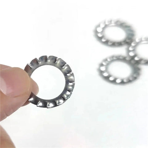 Close-up of a Stainless Steel 304 External Toothed Washers Set 300 Piece Serrated Lock Gasket Assortment DIY Friendly for Bolts and Fasteners