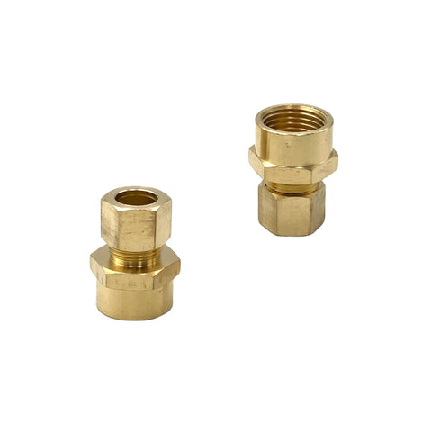Two brass compression union fittings, 1/2 in tube OD to 1/2 in female NPT, front view.