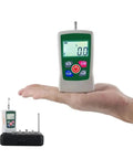 Digital Force Gauge Push Pull Meter With Straight Shot Accuracy And Easy Toggle Modes For Kickin Field Testing across Newton Kilogram Pound and Ounce Units in a compact green portable housing held in hand.