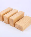 Premium Natural Solid Wood Yoga Block With Rounded Corners And Slick Grip For Legit Balance Training And Killer Flex Stretches And Top Shelf Core Conditioning Sessions, showcasing four blocks in a row.