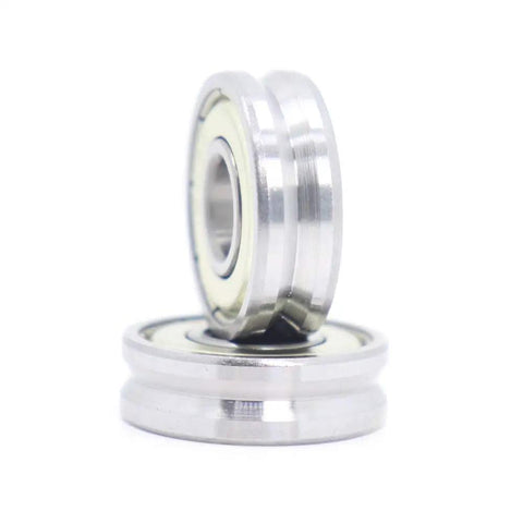Four Pack V Groove Sealed Ball Bearings 8X22X7Mm For Linear Motion And Pulley Wheels, focus on silver metallic bearings stacked.