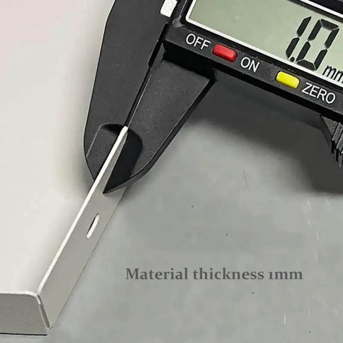 Close-up of a measuring caliper showing 1mm thickness of the Universal EV Charger Cover With Wall Mount Hardshell Enclosure.