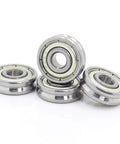 Workhorse Grade V Groove Sealed Ball Bearings Crafted For Pulley Wheel And Guide Track Roller Tracks Built Tough close-up on polished steel surface