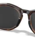 Top Shelf Shatterproof Sunglasses And Work Safety Shades Featuring Premium Polarized Grey Lenses For Men And Women Encased In A Dope Gloss Tortoise Build Packing Serious Uv Defense, angled view showcasing the frame.