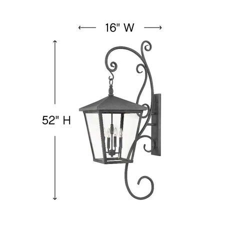 Extra Large Four Light Outdoor Wall Lantern With Built Tough Traditional Scroll Frame And Rust Proof Aged Zinc Finish mounted, 52" H by 16" W.