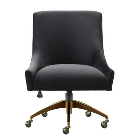 Antique Bronze Furniture Casters with No Sweat Rolling Action on a black upholstered chair with a quiet swivel base.
