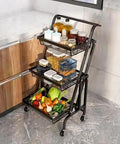 Heavy Duty Metal Rolling Storage Cart With Smooth Rolling Wheels For Kitchen Bathroom Laundry And Office Folding Utility Shelf filled with jars and produce.
