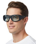 Man wearing Built Tough Laser Safety Glasses With Broad 870 To 11000Nm Range And OD4 Plus Optical Density for eye protection.