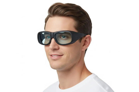 Man wearing Built Tough Laser Safety Glasses With Broad 870 To 11000Nm Range And OD4 Plus Optical Density for eye protection.