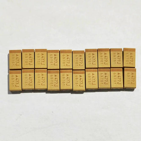 Twenty Pack Of Pro Grade Tantalum Capacitors Brings Serious 470 UF And 6.3 Volt Juice To Your Rig For Smooth Smd 7343 Circuit Mods And Everyday Gear Upgrades, showing aligned 20-piece tantalum capacitors.