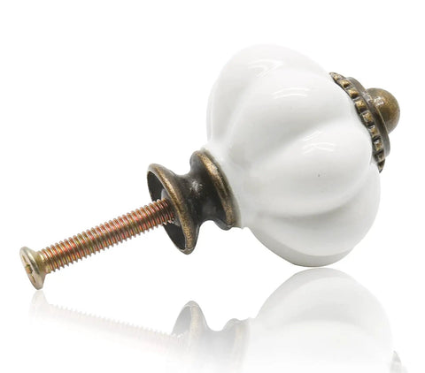 Top Shelf Vintage White Ceramic Pumpkin Cabinet Knobs Totally Bangin Styles For Kitchen Drawers And Bedroom Dressers Gonna Upgrade Any Space Quick Install 12 Piece Hardware Bundle Included, close-up of a ceramic pumpkin knob with screw.