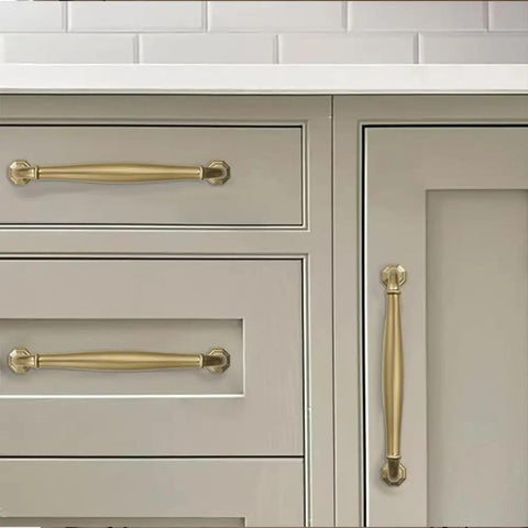 Top Shelf Brushed Brass Cabinet Pulls 10 Pack 5 Inch Center To Center Heavy Duty Solid Metal Handles Warm Gold Finish on kitchen drawers.