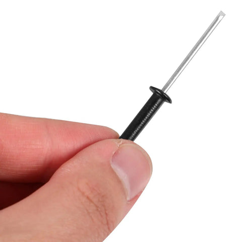 Close-up of hand holding 50Pcs Black Aluminum Round Head Blind Rivets With Flange M4x25mm Long Grip Pop Rivet Kit for metal fastening.