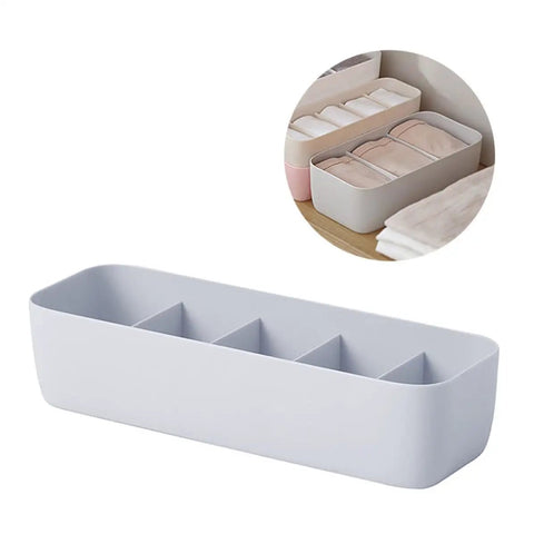 Stackable Plastic Underwear Storage Containers With Divided Compartments To Straighten Up Your Wardrobe Kick Clutter To The Curb Keeping Socks Bras Neck Ties Squeaky Fresh, grey organizer with four compartments.