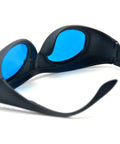 Kickbutt CE Certified IR Laser Safety Goggles With No Cap OD6 Plus Protection For 600 To 1100Nm Wavelengths blocking 808Nm 980Nm and 1064Nm angled view with blue lenses.