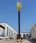 Rock Solid Self Propelled Telescopic Lifting Platform For Professional Aerial Work, 9m tall, in a construction site, showcasing heavy-duty vertical sleeve mast.