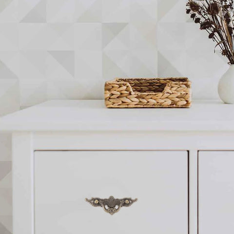 Front view of white dresser with Vintage Cabinet Handles 4.33 Inch Antique Brass Drawer Pulls, decorative hardware for smooth operation.