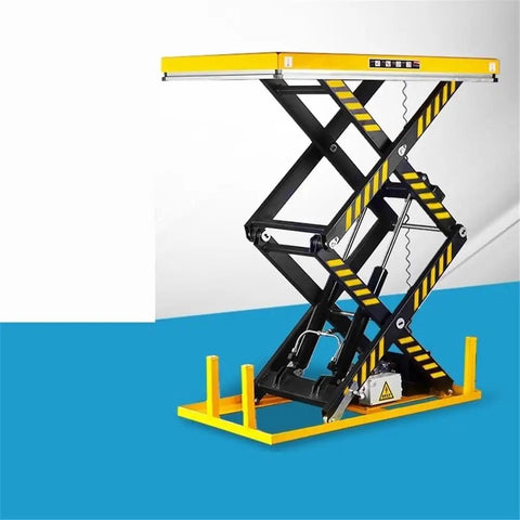 Rock Solid Electric Hydraulic Lift Table Featuring A Nasty 2200 Pound Capacity, black and yellow lift table with adjustable platform.