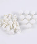 100 Piece Tough As Nails R Type Plastic Rivet Nut Kit With Nylon Buckle Clips For Car Panels And Pcb Boards Snaps Right In For Auto Trim And Diy Fixes No Sweat Installation Guaranteed All Day. White nylon rivet nuts arranged on a white surface.
