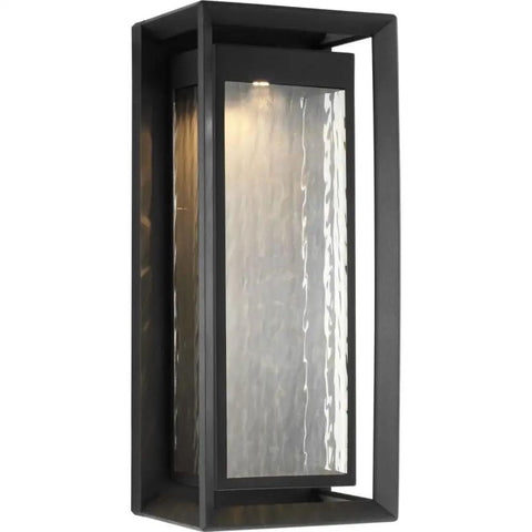Next Level Urbandale Extra Large Outdoor Wall Lantern With Integrated LED And 2700K Warm Glow showing clear water glass and textured black finish.