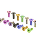Pro Level M3 Gr5 Titanium Alloy Flat Countersunk Hex Socket Set Screws Coated In Durable Rainbow Finish displayed in various colors.