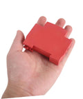 Snap On Aerosol Fire Extinguisher Housing 4 Pack for Heavy Duty Industrial Electrical Panels shown in hand, compact size and red material.