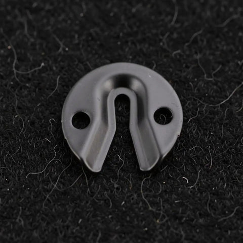 Close-up of a black stainless steel keyhole hanger for wall mounting, part of the 10 Pack Heavy Workhorse Keyhole Wall Hangers With Screws.