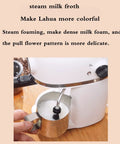 Slick Compact Semi Automatic Espresso Machine With Integrated Milk Frother and Steam Wand creating dense milk froth in a metal pitcher.
