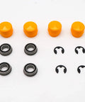 Pro Grade Steering Spindle Kit Replacement For John Deere Lawn Mowers includes orange caps, bearings, and clips for easy installation.