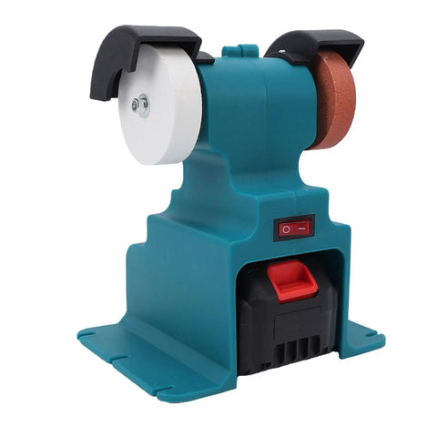Cordless Mini Bench Grinder Featuring Two 4000mAh Batteries And A Beefy 200 Watt Motor Popping Out 7000 Rpm on a worktable with grinding pads.