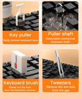 Electronics cleaning kit by Amazon, black with key puller, puller shaft, keyboard brush, and tweezers on a keyboard.