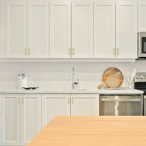 Modern kitchen scene featuring Pro Grade Brushed Gold Cabinet Handles And Sleek Modern Pulls With A Straightforward Three Inch Hole Center Spacing Heavy Duty Zinc Frame For No Fuss Installation And Sharp Home Refresh Smooth Glide Two Pack.