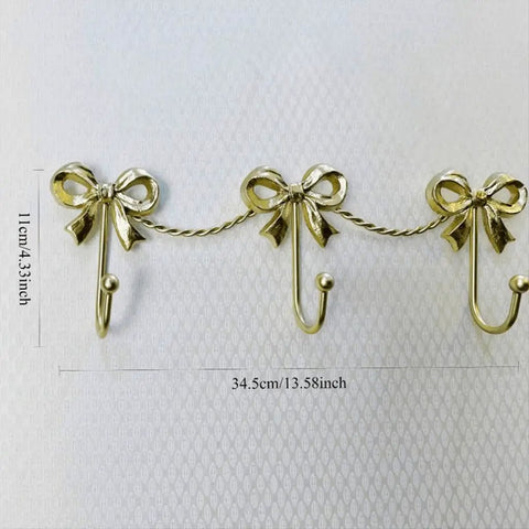 Kickass Heavy Duty Wall Mounted Coat Hook Bulletproof Metal Clothes Hanger with three hooks and decorative bows, 34.5cm.