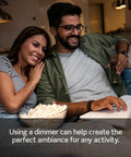 Couple enjoying movie night using Table Top Plug In Lamp Dimmer Switch Compatible With Dimmable LED Halogen And Incandescent Bulbs Up To 300 Watts Black Outlet Adapter.