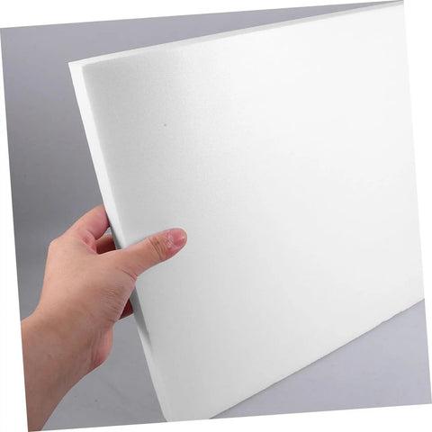 Person holding a high-density PU foam sheet from 2 Pack High Density PU Foam Sheets Heavy Duty Cuttable Packing Pads.