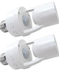 Two Pack Motion Activated Light Socket Adapters For E26 E27 Screw In Lamps, Easy Add On Auto On Off Sensor Lighting, Dusk To Dawn Indoor Lights For Porch Garage Basement. White plastic motion sensor socket adapters with E26/E27 screw base