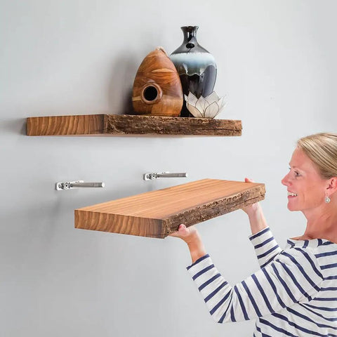 Person installing shelf using Isemble Floating Shelf Drill Guide Self Centering Jig for precise shelf installation and alignment